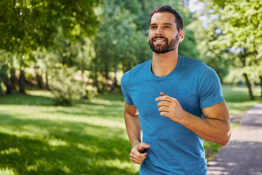 Man jogging outdoors showing vitality from online TRT in Ellicott City MD